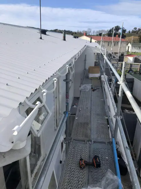 New spouting and roof edge on a commercial building